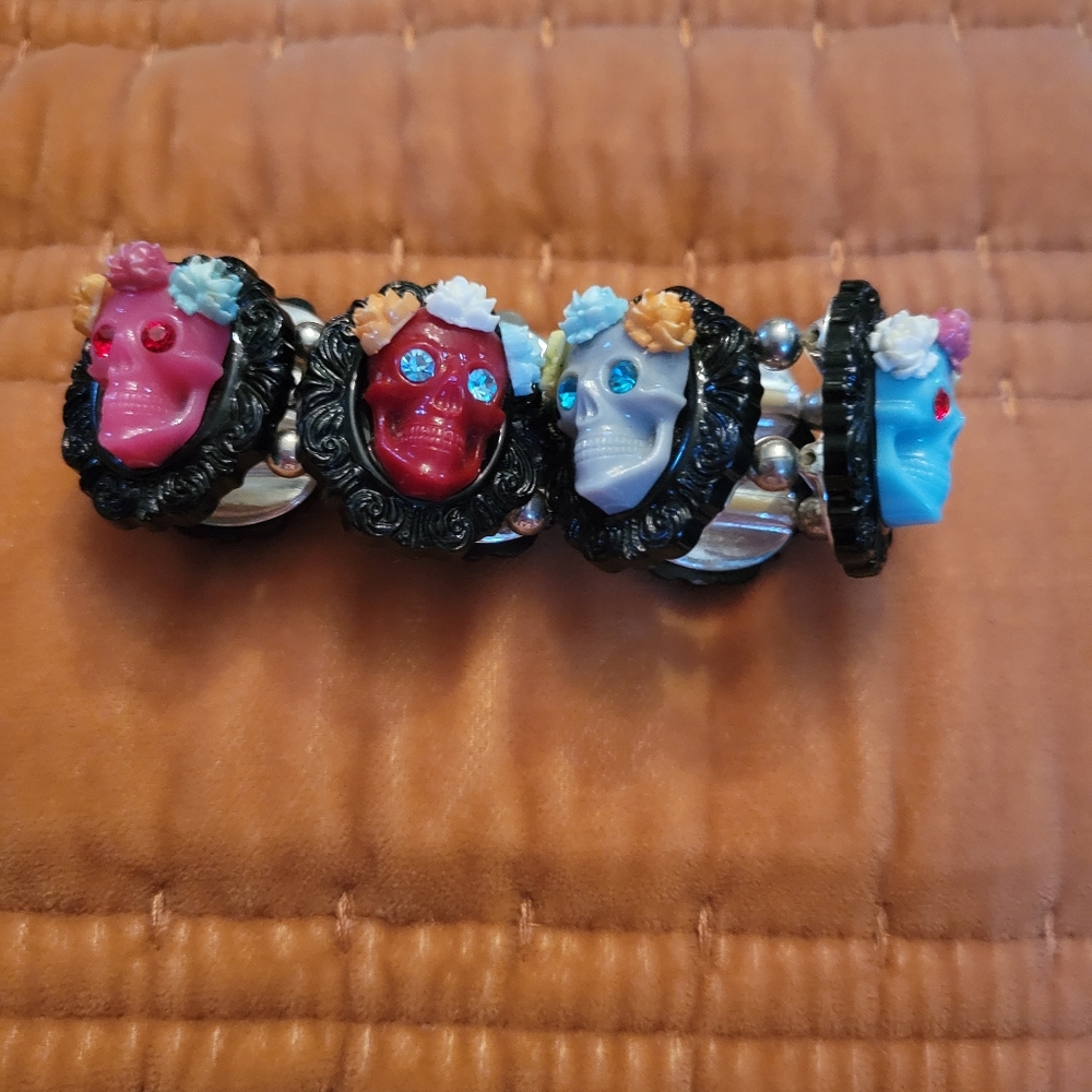 Tarina Tarantino sugar skulls with flower crowns framed stretch bracelet